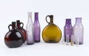 Ten assorted antique glass bottles and jars, 19th century, ​the largest 25cm high