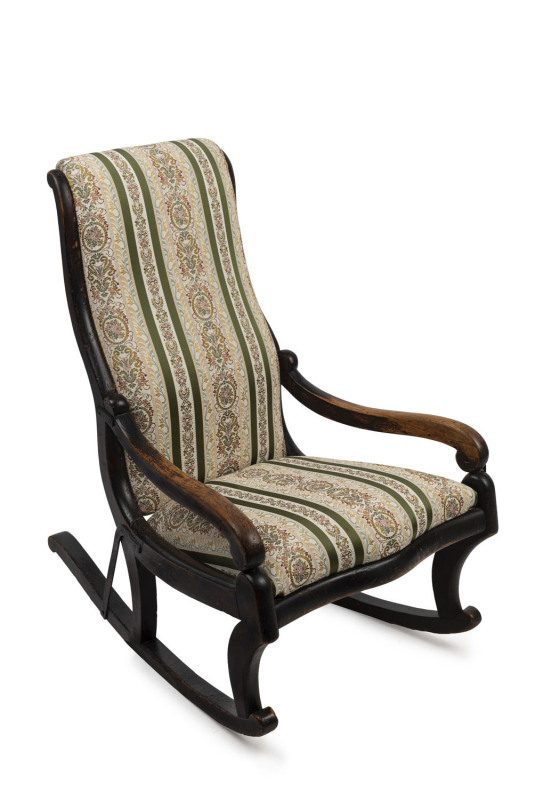 A Colonial ladies blackwood rocking chair, Tasmanian origin, mid 19th century, several 19th century iron strap restorations (enhancing the character of the piece), 87cm high, 56cm across the arms