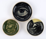 Three Australian pottery dishes, one not signed, the portrait examples incised "DORIAN SANDS" and "TOM SANDERS", the largest 12cm diameter