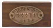 A carriage plate, cast metal "WAGON No 22278, 1970", ​12cm wide