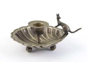 A silver plated candle holder with kangaroo handle, circa 1900, 8cm high, 15cm wide