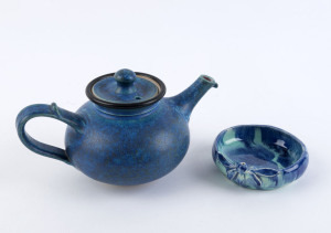 HARVEY SCHOOL blue glaze pottery dish with gumnuts and leaves; together with a studio pottery teapot by ARNAUD BARRAUD, the dish 10cm diameter