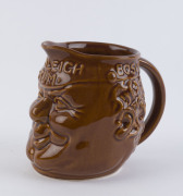 BEENLEIGH RUM brown glaze pottery character jug, incised "Elischer, Australia" 14cm high 17cm wide - 2