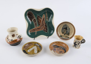 Six pieces of Australian pottery with Aboriginal motifs by DORIAN SANDS, BERYL ARMSTRONG and others, the largest dish 20cm wide