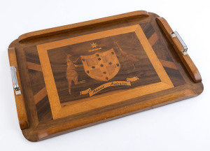 An Australian serving tray inlaid with coat of arms emblazoned "ADVANCE AUSTRALIA, 1949", Queensland origin, ​53cm across the handles