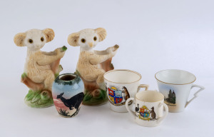 A pair of koala statues, pottery vase and three porcelain cups, 19th and 20th century, (6 items), ​the statues 16cm high