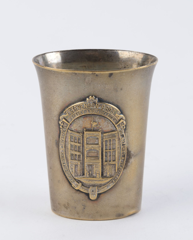 STEVENSON BROTHERS silver plated posy vase displaying an architectural vignette of the store, emblazoned "Stevenson Bros. Sydney And Adelaide Manufacturers & Importers Of Watches & Jewellery", ​7cm high, 5.5cm wide