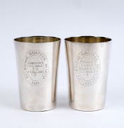 Two "MELBOURNE AMATUER REGATTA " silver plated trophy beakers engraved "1938, Maiden Eights, Banks R.C., C.T. Brady 6.", and "1937, Junior Eights, Richmond R.C., A.S. Williams 2.", 12cm high - 2