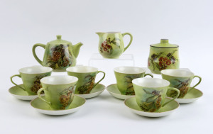 IRENE RODGERS 15 piece "Flowering Gums" hand-painted porcelain tea set, ​the teapot 11cm high, 15cm wide