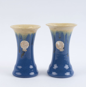 REMUED pair of blue glazed pottery vases, both with original foil labels, 13cm high