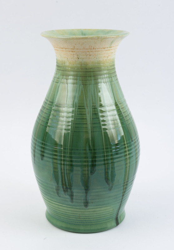REMUED tall green glazed pottery vase with ribbed decoration, incised "Remued 26-12", with original foil label, ​29.5cm high