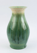 REMUED tall green glazed pottery vase with ribbed decoration, incised "Remued 26-12", with original foil label, ​29.5cm high