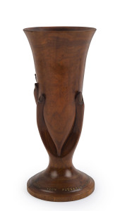 "Souvenir From Pitcairn Island" carved wooden hand with cup, early to mid 20th century, 26cm high