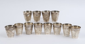 A set of 12 Indian silver beakers, 20th century, stamped "Sterling Silver", ​5.5cm high, 300 grams total