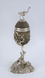 An emu egg cup and cover with silver plated mounts, most likely English, late 19th century, 39cm high