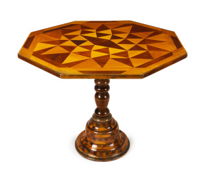 An Australian octagonal centre table with blackwood, huon pine, cedar, silky oak, silver ash, honeysuckle and pine, circa 1930s, ​75cm high, 94cm across