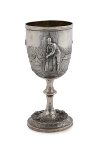 WILLIAM EDWARDS Cricket trophy cup, superb repoussé decoration with a cricketer and tent pavilions in Australian landscape. With remains of gilt wash interior, Melbourne, 19th century, stamped "W. E." with emu and kangaroo, 18cm high
