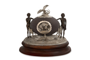 J. M. WENDT rare Australian silver mounted emu egg inkwell on timber plinth, adorned with Aboriginal figures, cockatoo finial and mirrored inset cartouche with kangaroo and emu in landscape decorated with fern fronds, South Australia origin, 19th century, stamped "J. M. W." with crown and lion passant, 20.5cm high, 22cm wide, 15.5cm deep overall