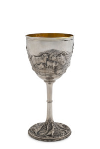 WILLIAM EDWARDS Australian Colonial silver presentation goblet, finely decorated with Edwards' typical repoussé decoration depicting sheep in Australian landscape and the base adorned with kangaroos and emus in landscape, with original gilt wash interior, Melbourne, 19th century.