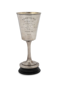 J. M. WENDT "Waterloo Cup" Colonial silver trophy cup, engraved "S. A. Coursing Club, Waterloo Cup, Presented By Mr T. Barr Smith, Won By Mr C. Mallen's Br D Mozart, By Faultfinder, Buckland Park, 1889", stamped "J. M. Wendt, Adelaide" with crown and lion marks, on a turned wooden base, trophy 25cm high, 28cm overall, 550 grams total