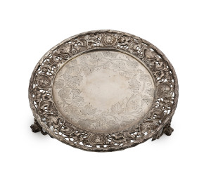 WILLIAM EDWARDS Australian silver salver engraved with grapes and vines and a stunning neo-classical pierced and repoussé border, circa 1860, stamped "W. E. Sterling Silver" with kangaroo and emu marks, further stamped "W. Edwards Manufacturer By Appointment H.R.H. Duke of Edinburgh" 24cm diameter, 590 grams