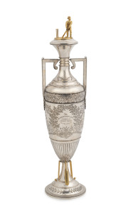 HENRY YOUNG & Co. important Australian silver cricket trophy adorned with gilded batsman and wicket, cricket bats, balls and stumps, engraved "The Melbourne Sports Depot. Junior Cricket Club Trophy, Season 1884 & 5. Won By The Dudgeon & Arnell C.C., Presented By The Members To J. Aitken Esq President, 29th May 1885". stamped "H. Young & Co. Sterling Silver", 50.5cm high