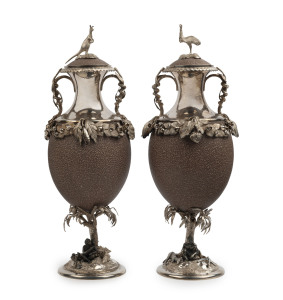 CHRISTIAN LUDWIG QVIST: A stunning pair of Australian silver mounted emu egg urns adorned with Aboriginal figures seated in strikingly natural poses with weapons and tools, kangaroos and an emu. A tour-de-force of Colonial silversmithing, museum quality. 