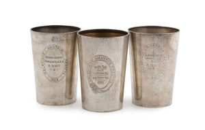 Three "MELBOURNE AMATUER REGATTA" Australian silver trophy beakers engraved "1923 Maiden Eights, Mercantiler R.C., R. Scott", "1926 Maiden Four Won By Essendon R.C., R.W. Scott No.3", and "1931 Junior Eights, Mercantiler R.C., R. Scott". Stamped "BRADSHAW, STG. SILVER", 12cm high, 670 grams total Note: Featured in "19th Century Australian Gold and Silver Smiths" by Kurt Albrecht.