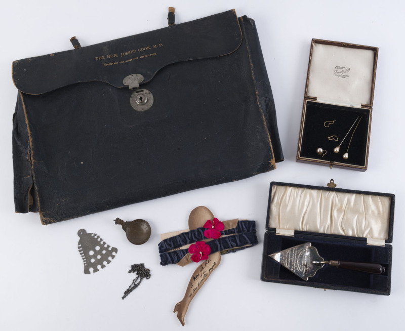 THE HON. JOSEPH COOK, M.P. ministerial document satchel, presentation silver plated trowel in box, ephemera, caddy spoon, jewellery and Bell gauge needle sizer, (8 items).