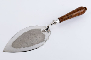 ECHUCA INTEREST. Australian silver plated presentation trowel with fiddleback blackwood handle, engraved "Presented To HON. H. McKENZIE At The Laying Of Foundation Stone, Soldiers Memorial Wing Echuca Hospital, 13.9.28", 31cm long