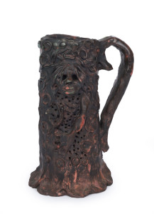 GREG IRVINE pottery tankard with applied figural decoration, hand written label "Greg Irvine, 1964", 20cm high