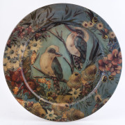 A circular kookaburra wall plaque, late 20th century, ​signed "Mallama McClein, S. Aust." 50cm diameter