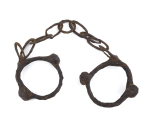 CONVICT LEG IRONS in relic condition, early 19th century, 70cm long
