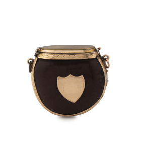 An antique burra nut vesta with gold plated mounts, 19th century, 5cm wide
