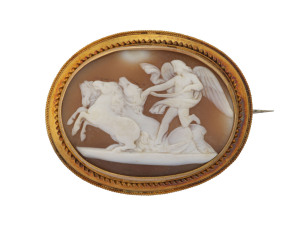 A fine and large antique oval cameo brooch mounted in yellow gold showing Helios with his team of horses, 19th century, 6cm wide