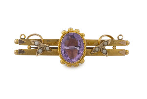 AARONSON & Co. (Melbourne) antique 9ct gold bar brooch set with large amethyst and seed pearls, stamped "9" with two pictorial marks, 4.5cm long, 4.1 grams total