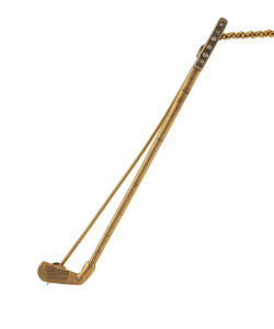 NEWMAN'S 9ct yellow gold bar brooch in the form of a golf club with diamond set hand grip, in original box, circa 1900, 6.5cm long