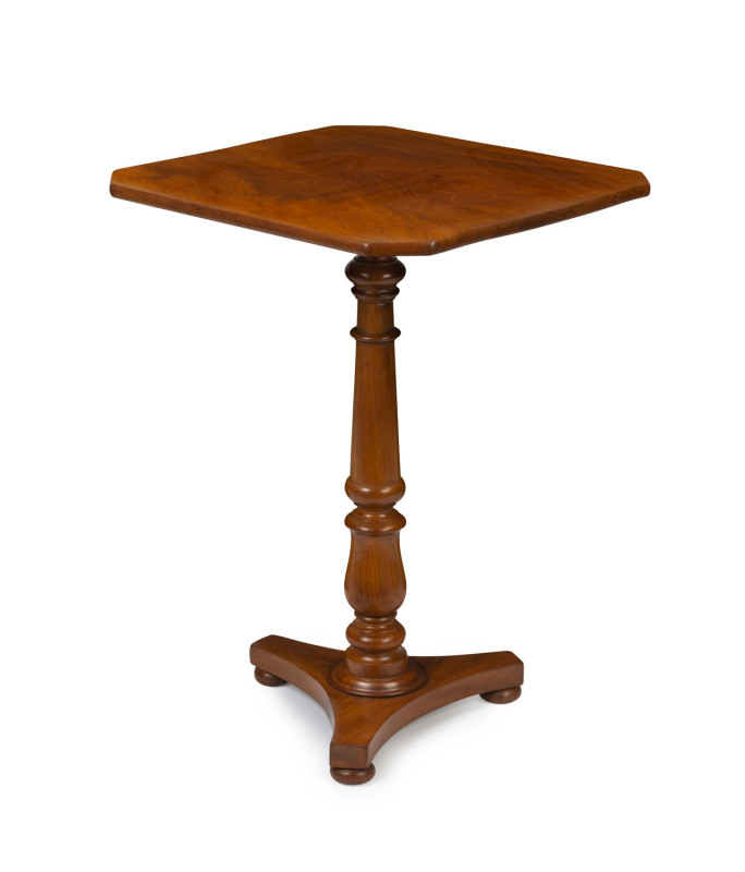 An Australian Colonial wine table with tripartite concave platform base, carved cedar, early 19th century, 73cm high, 53cm wide, 50cm deep