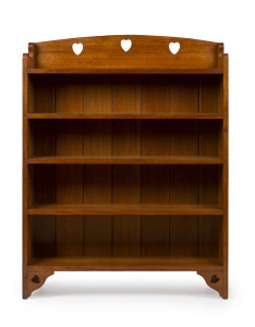 An Australian Arts and Crafts bookshelf, Tasmanian Oak, circa 1910, "Coogan's, Tasmania" label on the back, 120cm high, 91cm wide, 23cm deep