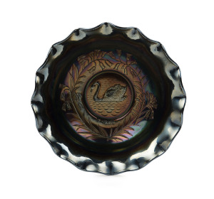 CARNIVAL GLASS cobalt "Black Swan" fruit bowl, circa 1920s, ​8cm high, 23.5cm wide