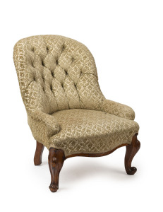 A Colonial parlour chair, carved cedar frame with jacquard upholstery, circa 1875, 59cm across the arms