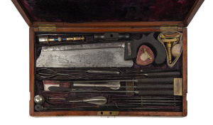 A ship's surgeon's kit, an impressive array of surgical implements and tools in original brass bound mahogany case inscribed "Cap'tn WALKER To W.J. PILCHER MR.C.S. 1861", ​the case 40.5cm wide