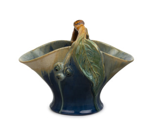 REMUED blue glaze pottery basket vase with applied gumnuts and leaf, incised "Remued 194/8M", 17cm high, 21cm wide