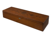 A Colonial violin case, kauri pine inlaid with cedar, myrtle and huon pine, Tasmanian origin, 19th century, attractively fitted interior with original velvet lining, ​15cm high, 79cm wide, 24cm deep