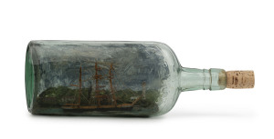 A ship in an "Imperial Pint" bottle, ​24.5cm long