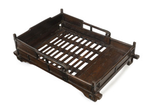 A rare Korean palanquin (Uija Gama), box construction in elm with slatted base and railings along both sides, original iron mounts including rings and square section openings for carrying poles which would have been borne by four carriers. Late Joseon Dyn