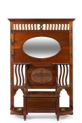 ROJO Federation hallstand, carved blackwood with original metal fittings, circa 1900, maker's ink stamp under lid, 209cm high, 147cm wide, 42cm deep