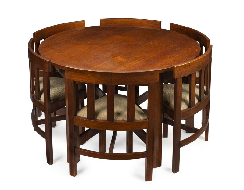 A seven piece Australian Arts & Crafts circular dining setting, solid blackwood, circa 1920s, 73cm high, 122cm diameter