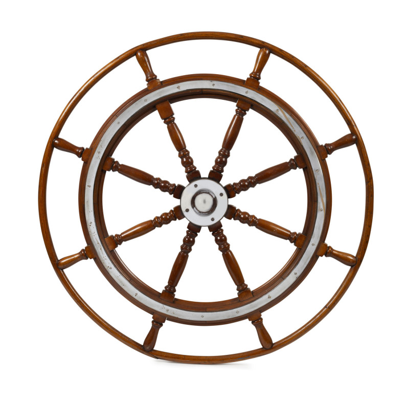 An impressive antique ship's wheel, solid turned mahogany with nickel plated brass fittings, 19th century, ​135cm diameter