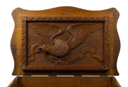 An impressive "ADVANCE AUSTRALIA" oak glory box, profusely carved with kookaburras, snakes, kangaroo and emu flanking a monogrammed crest "J.M.", the interior handsomely adorned with carved bird and swag emblazoned "With Best Wishes", circa 1880 ​95cm hig - 3